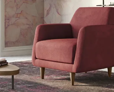 Poltroncina in tessuto con piedi in legno Adele di Doimo Salotti