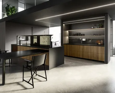 Cucina Design con isola Nautila 04 in Noce Canaletto con top in gres nero natural di Arrital